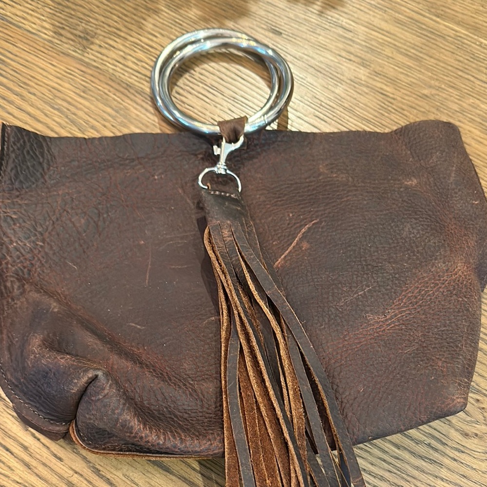 Brown Leather Clutch with Silver Ring. Never used.